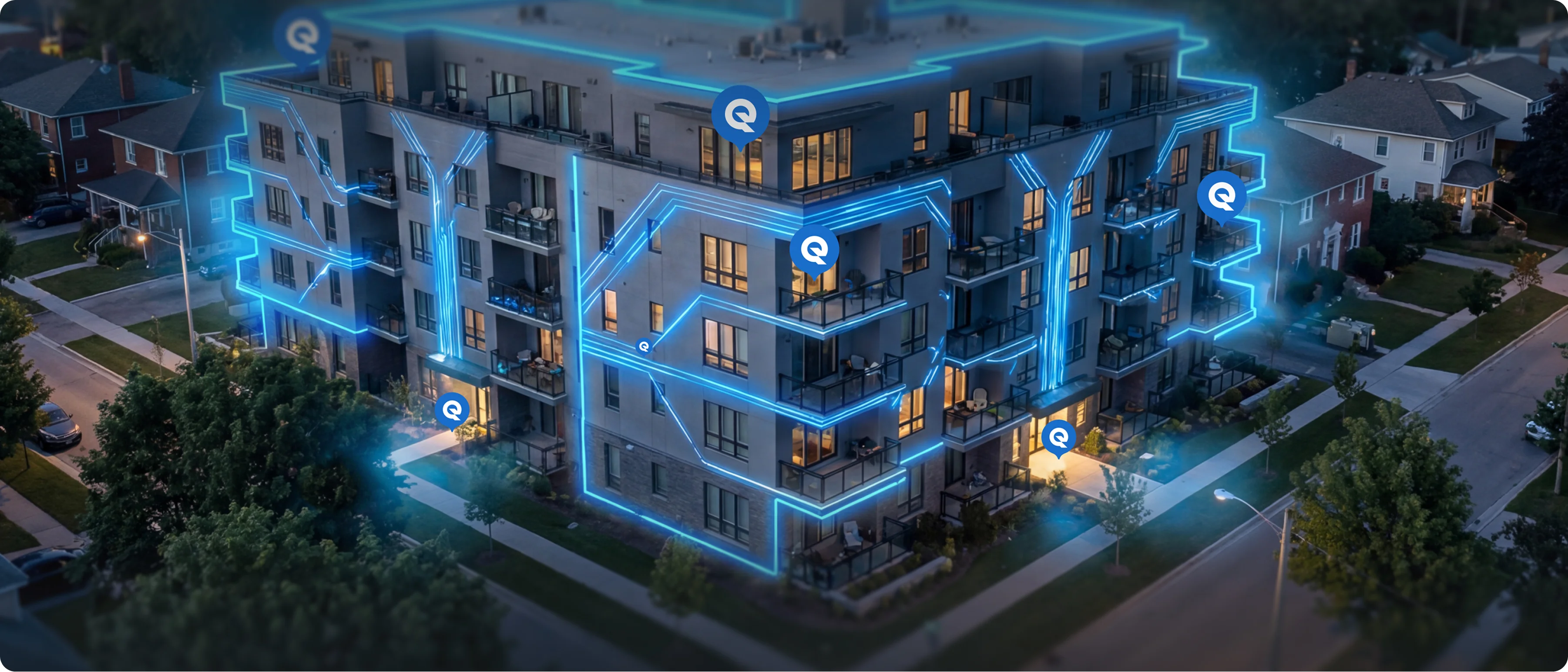 Illuminated modern apartment building at night